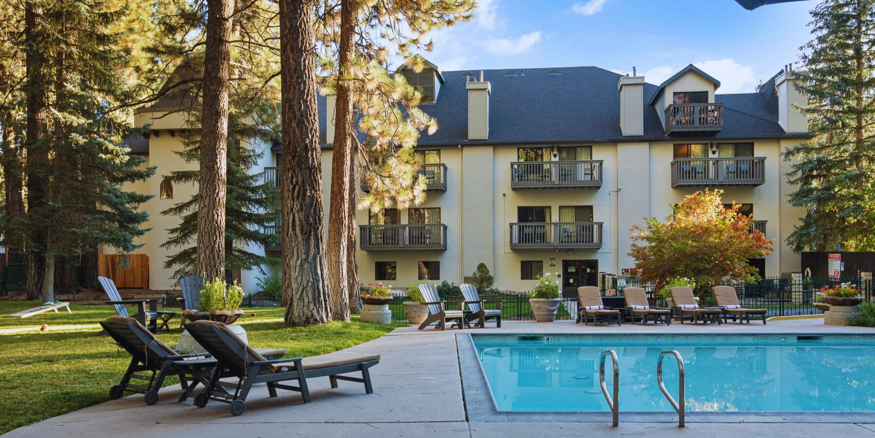 outdoor heated pool and lounge chairs